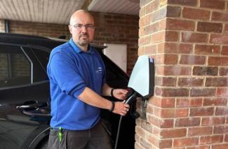 How Your EV Charger Talks to the Grid Without You Knowing It